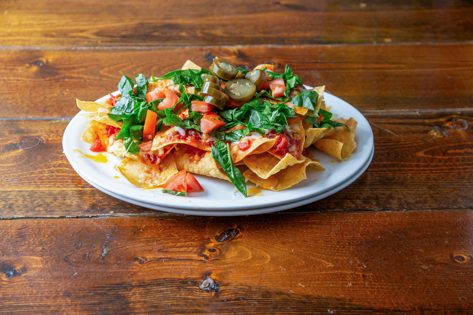 Tower of loaded nachos ready to share